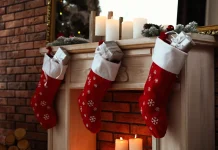 Christmas stockings hung by a brick fireplace