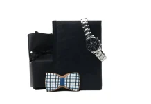 50+ Luxury Christmas Gifts For Him Over $1000 Luxury gift set for men with a wristwatch and wooden bow tie on a black gift box