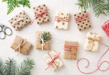 Small wrapped Christmas gifts tied with twine
