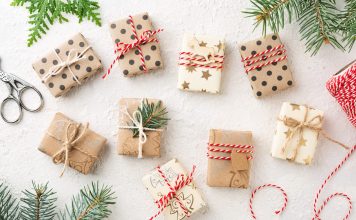 The 40 Best Secret Santa Gifts Under $25 Small wrapped Christmas gifts tied with twine