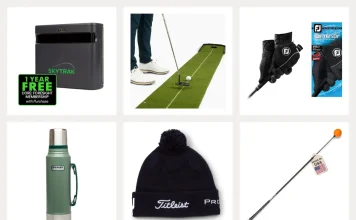 Winter golf gifts including a SkyTrak launch monitor, a putting mat, FootJoy WinterSof gloves, a Stanley thermos, a Titleist pom hat, and an Orange Whip swing trainer